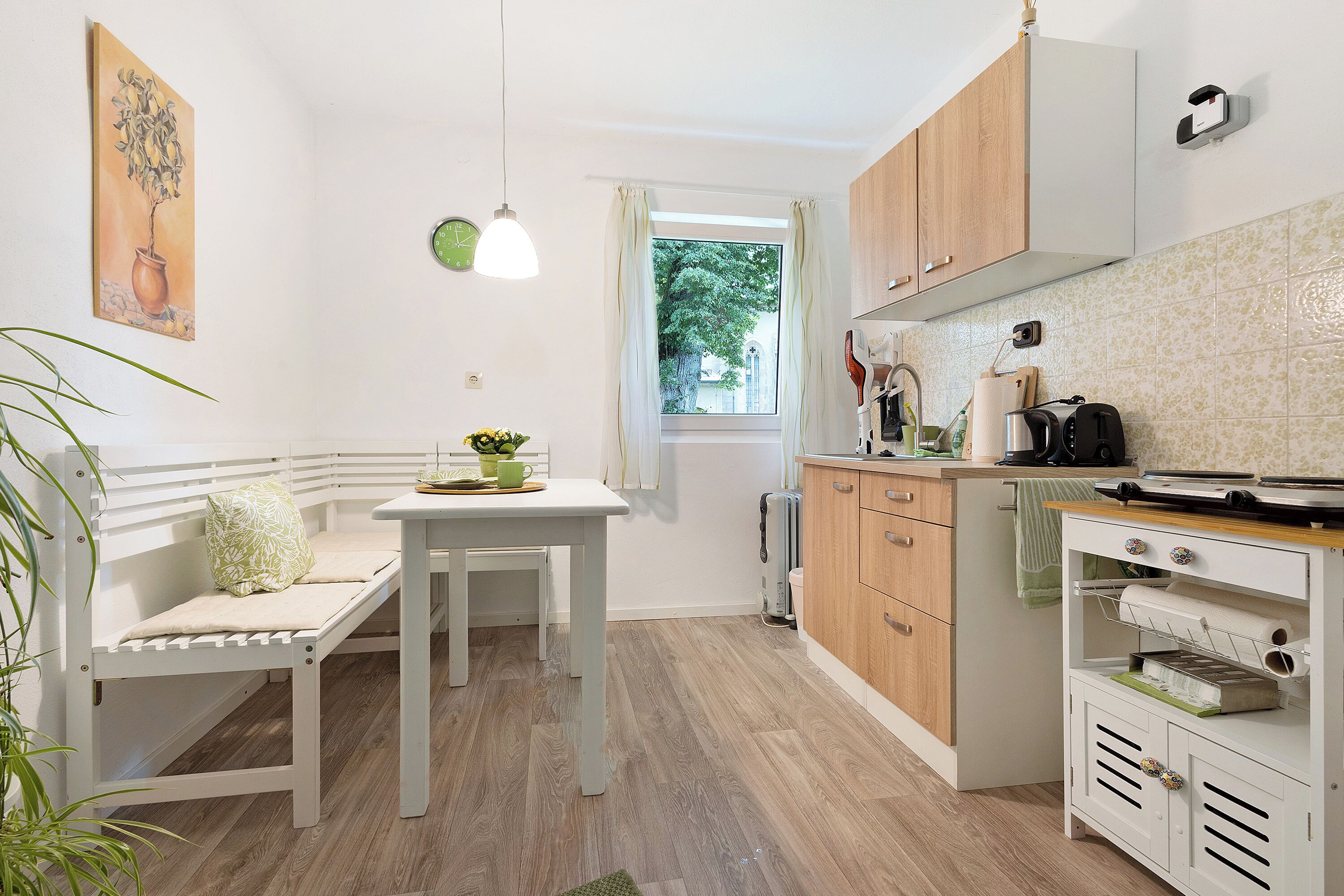 Fridge, microwave, stovetop, coffee/tea maker