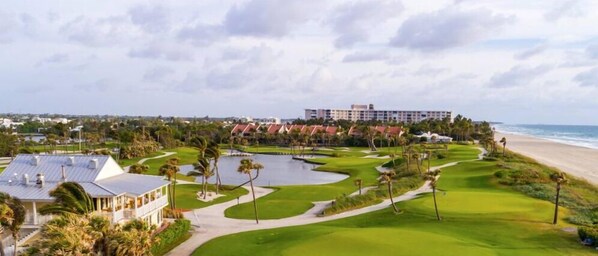 Enjoy golfing on the lush course with a scenic ocean view.