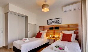 3 slaapkamers, een strijkplank/strijkijzer, gratis wifi