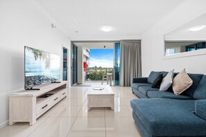 55-inch LCD TV with cable channels, TV - Harbour Quays Apartments (Biggera Waters)