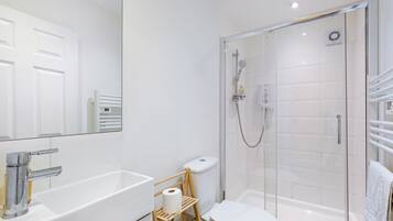 Shower, rainfall showerhead, towels