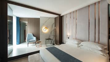 Habitación Deluxe | 1 dormitorio, ropa de cama de alta calidad, minibar y caja fuerte