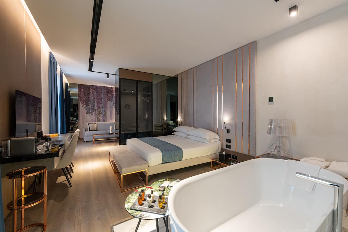 Suite, Bathtub | 1 bedroom, premium bedding, minibar, in-room safe