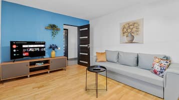 行政公寓 | 起居区 | 90-厘米液晶电视(配备数码频道)、电视、Netflix