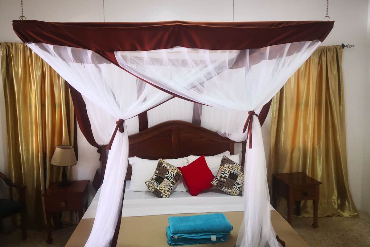 Minibar, lit parapluie, Wi-Fi gratuit, draps fournis