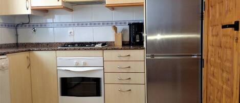 Fridge, microwave, dishwasher, coffee/tea maker