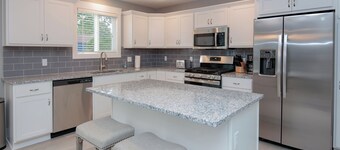 Beautiful new home, private heated pool, close to beach