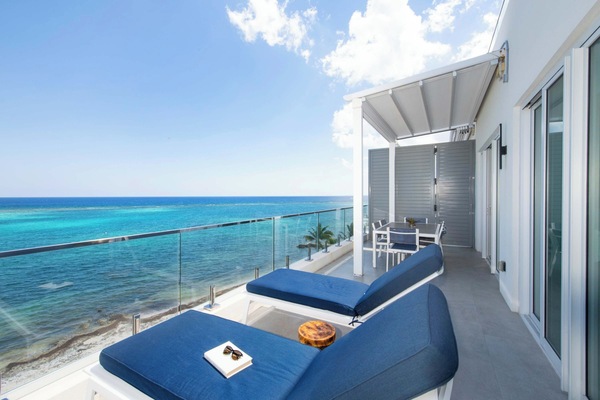 Relax and soak up the sun on this spacious balcony.