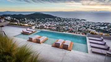 2 outdoor pools, pool umbrellas, sun loungers