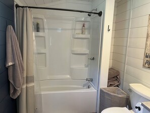 Hair dryer, towels, soap, toilet paper