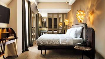 Premium bedding, down comforters, pillowtop beds, minibar