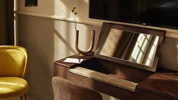 Premium bedding, down comforters, pillowtop beds, minibar