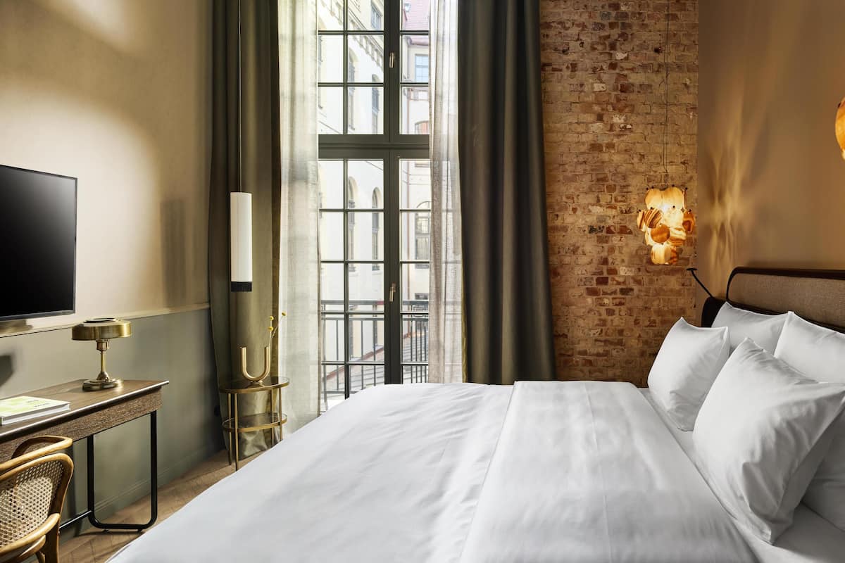 Premium bedding, down comforters, pillowtop beds, minibar