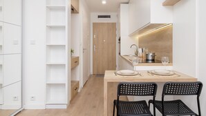 Studio, Balcony, Lakeside | Private kitchen | Coffee/tea maker, dishwasher, cookware/dishes/utensils, freezer - Studio Goszczynskiego Kraków by Renters (Kraków)