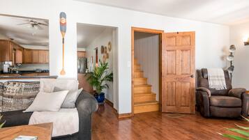 Smart TV, fireplace, books, computer monitors