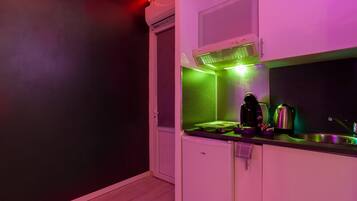 Fridge, microwave, stovetop, coffee/tea maker