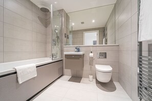 Bathtub, towels, shampoo
