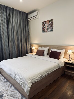 Standaard kamer | Donsdekens, pillowtop-bedden, een kluis op de kamer, een bureau