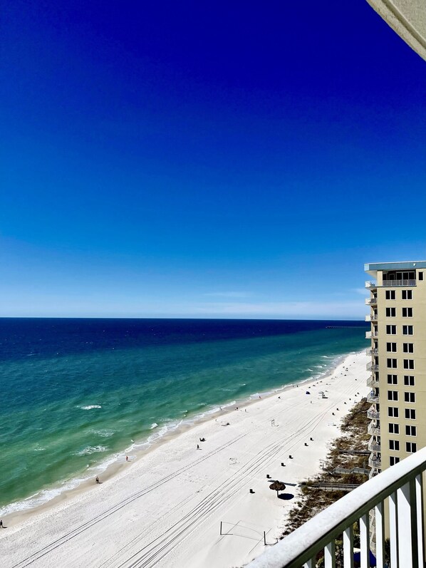 On the beach, sun loungers, beach towels