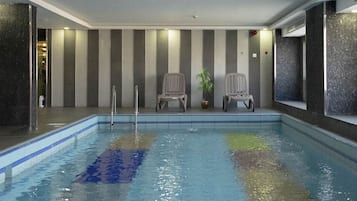 Indoor pool, open 7:00 AM to 7:00 PM, sun loungers