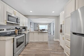 Fridge, microwave, oven, stovetop - Front St Lofts in Downtown TC (Traverse City)