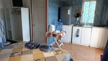 Traditional Cabin | Private kitchen | Full-sized fridge, stovetop, coffee/tea maker, toaster