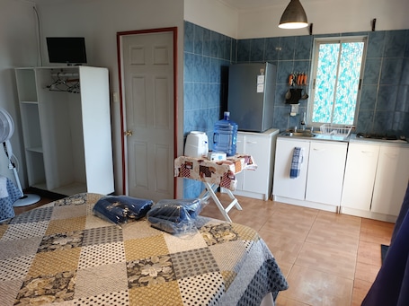 Traditional Cabin | Private kitchen | Full-size fridge, stovetop, coffee/tea maker, toaster
