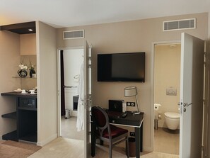 Quarto clássico | Área de estar | TV