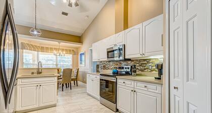 Fantastic home near beaches & docks with heated saltwater pool & office