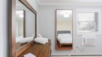 2 habitaciones, tabla de planchar con plancha y cuna de viaje