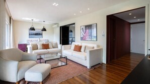 Apartamento Deluxe | Zona de estar