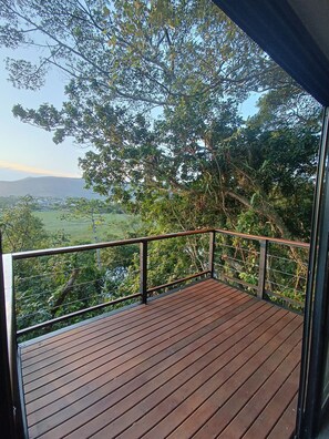 Casa Buda I - Piso Superior - Garopaba - SC | Varanda coberta