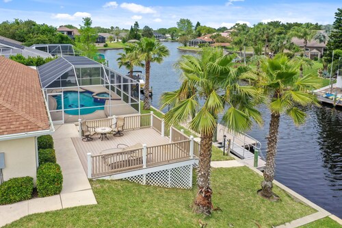 Saltwater canal home with swimming pool & 30' Dock!