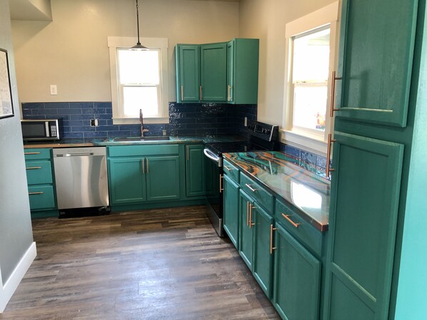 Fridge, microwave, oven, stovetop - Unique downtown Fruita apartment with bike storage! (Fruita)
