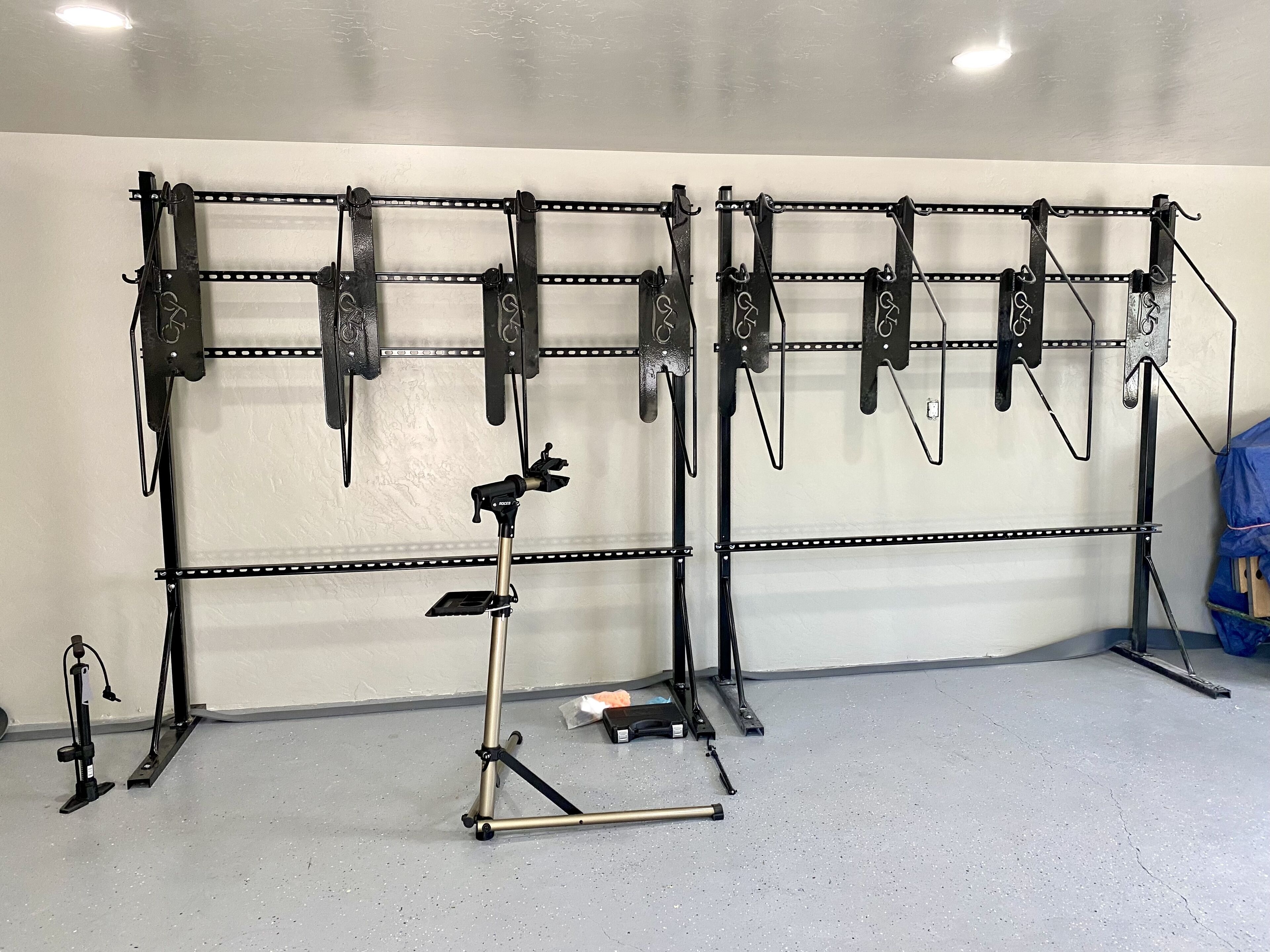 A storage rack with multiple hooks for hanging items.