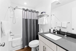 Hair dryer, towels, soap, shampoo