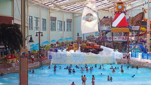 An indoor water park with multiple pools, slides, and a large ice-themed play area. - Modern Poconos Cabin w/ Hot Tub Near Kalahari & CamelBack Mountain ! (Long Pond)