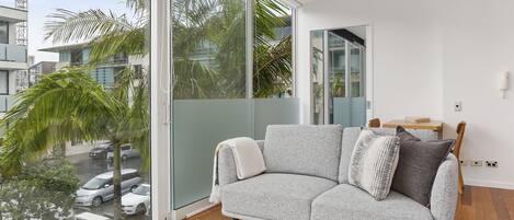 Deluxe Apartment | Living area | 50-inch Smart TV with digital channels, TV, Netflix