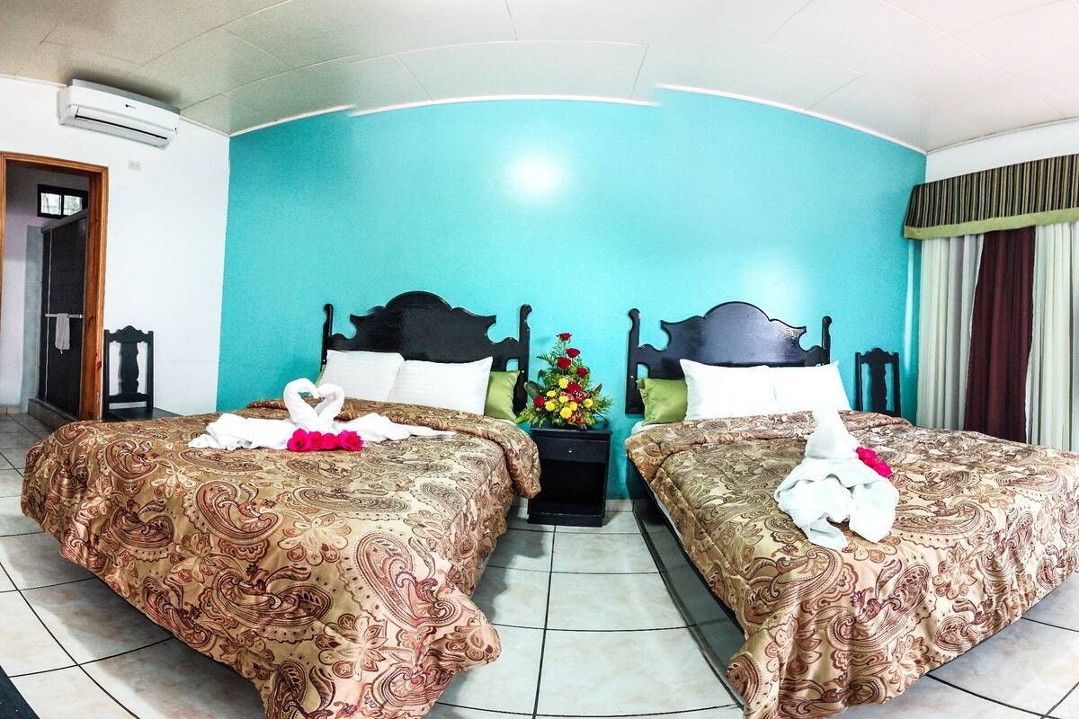 Standard Double Room, 2 Queen Beds | Individually furnished, free WiFi, bed sheets