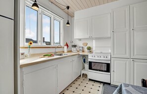 Fridge, stovetop, coffee/tea maker