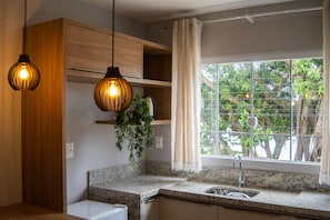 Deluxe Triple Room, 1 Bedroom, Lake View | Private kitchen | Electric kettle, cookware/dishes/utensils, paper towels