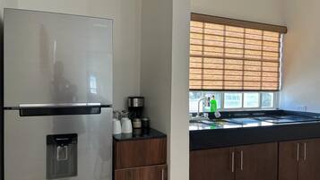 Executive House, 2 Bedrooms, Courtyard View | Down comforters, individually decorated, individually furnished