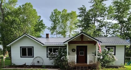 Peaceful house in Highwood Mountains. Private creek access. Large fenced yard.