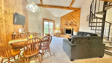 Smart TV, fireplace, books, music library