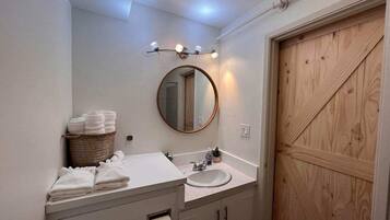 Hair dryer, towels, soap, shampoo