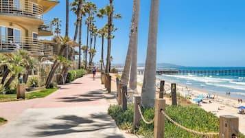 On the beach, sun loungers, beach towels