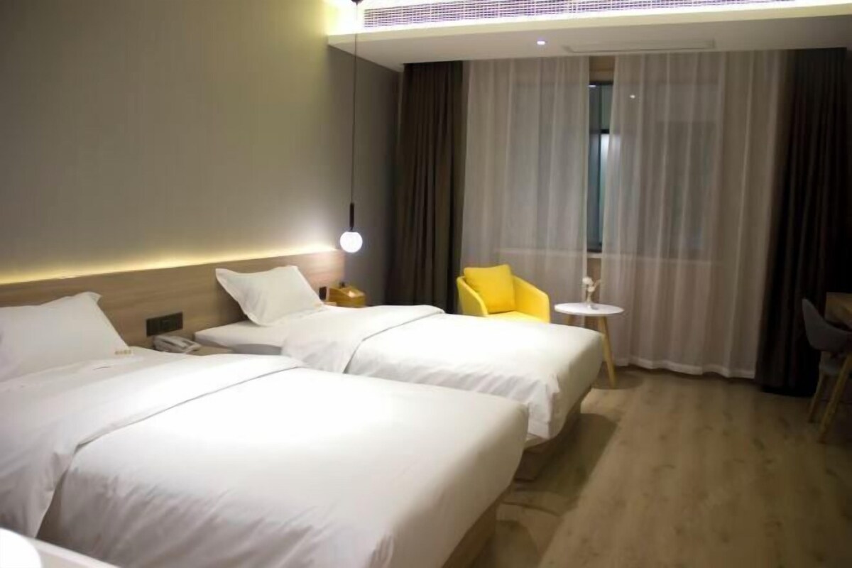 Down duvets, desk, blackout curtains, bed sheets
