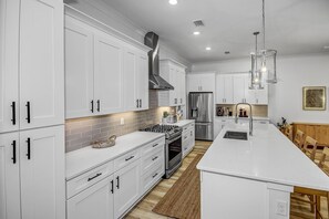 Fridge, microwave, dishwasher, coffee/tea maker