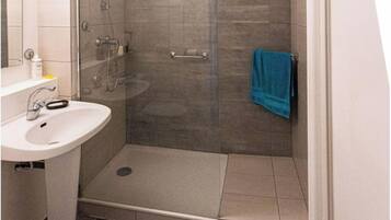 Shower, towels, soap, shampoo