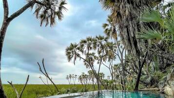 11 outdoor pools, pool umbrellas, lifeguards on site